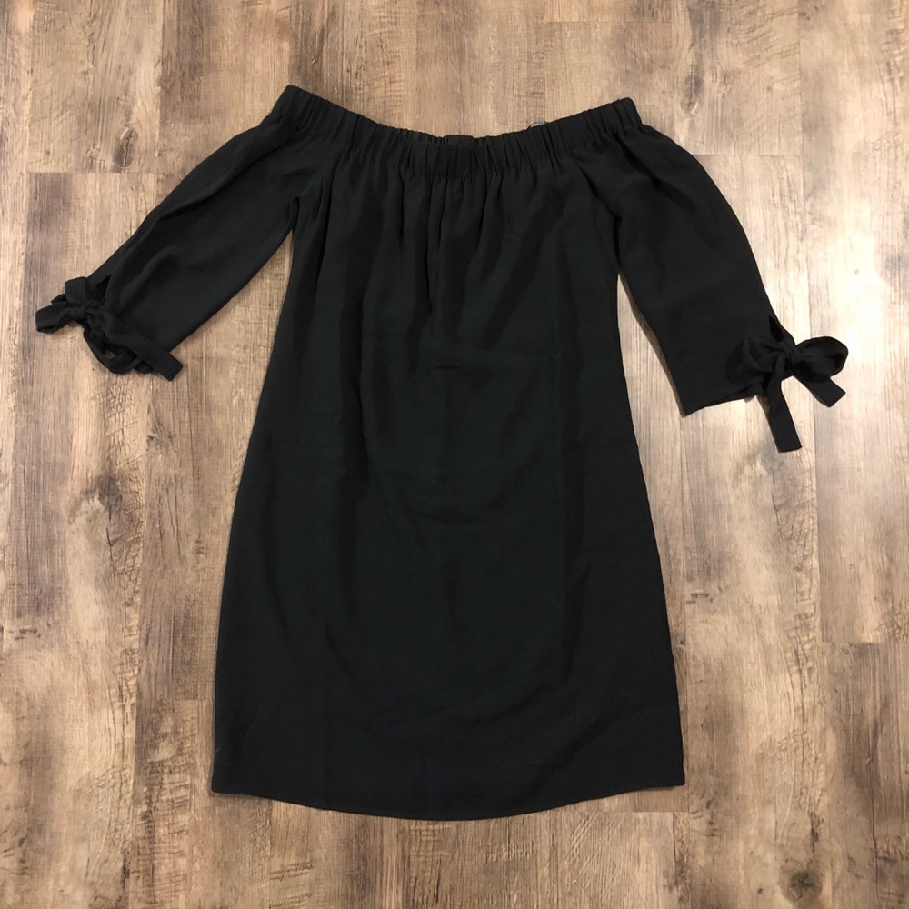 Classy off the shoulder little black dress.